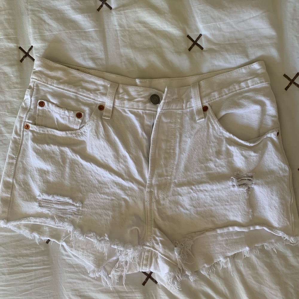 Levi’s 501 white distressed shorts